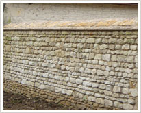 Réfection murs d'enceinte pierre sans joint visible